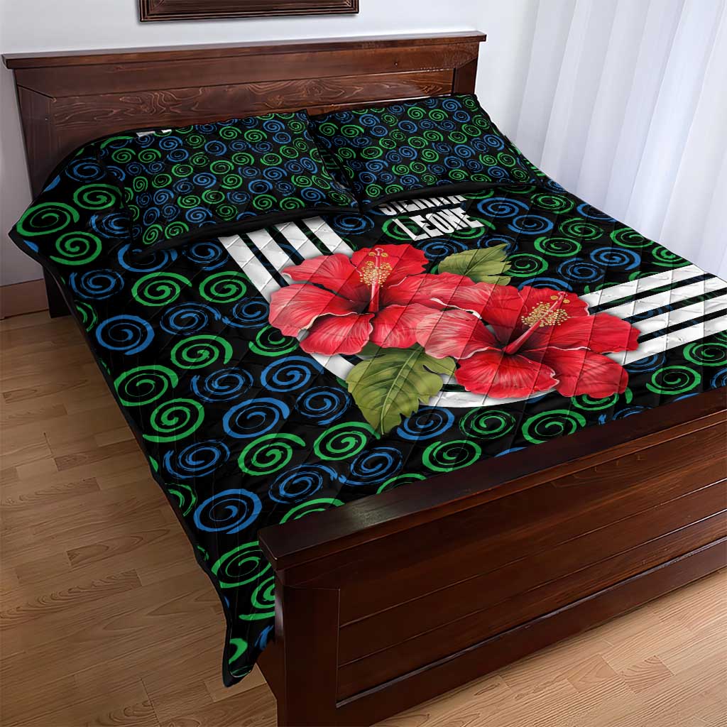Sierra Leone Quilt Bed Set with Red Hibiscus Floral Design and Tribal Swirl Pattern