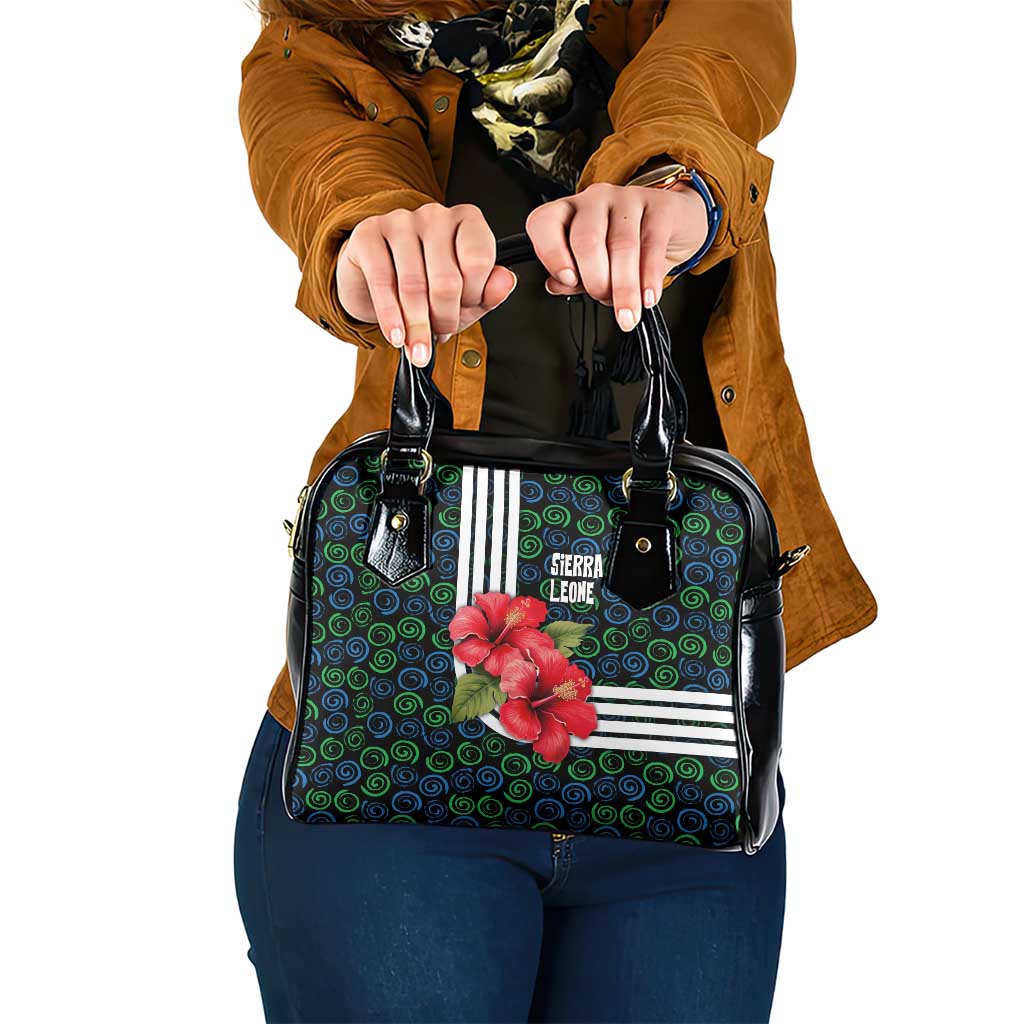 Sierra Leone Shoulder Handbag with Red Hibiscus Floral Design and Tribal Swirl Pattern