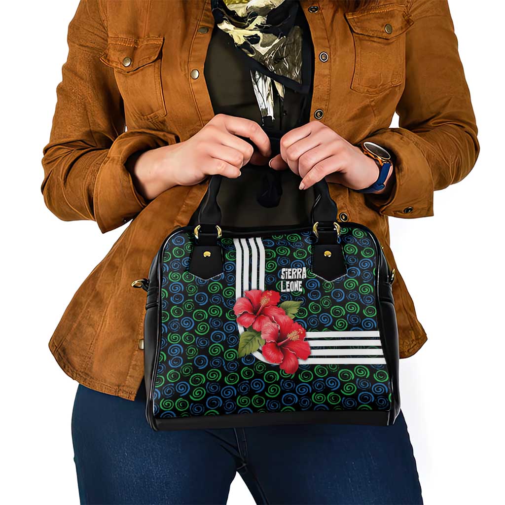 Sierra Leone Shoulder Handbag with Red Hibiscus Floral Design and Tribal Swirl Pattern