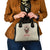 stuck-between-idk-idc-and-idgaf-skull-shoulder-handbag