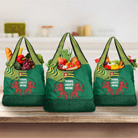 Togo Grocery Bag with Red Twin Lions and Travail Liberté Patrie Slogan