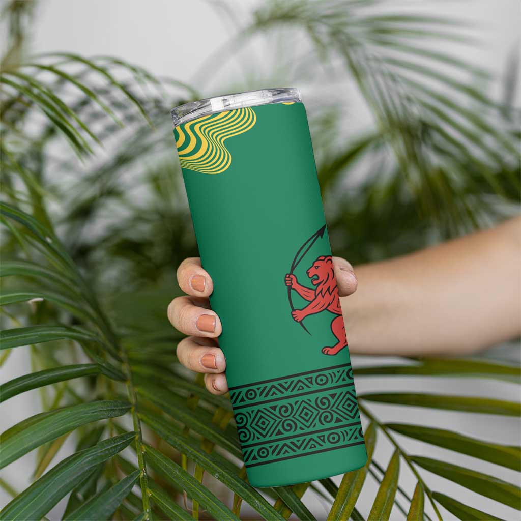 Togo Skinny Tumbler with Red Twin Lions and Travail Liberté Patrie Slogan