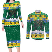 Gabon Christmas Couples Matching Long Sleeve Bodycon Dress and Long Sleeve Button Shirt with Black Panthers Carrying Tree and Green Yellow Snowflake Pattern - Wonder Print Shop