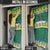 Gabon Christmas Door Cover with Black Panthers Carrying Tree and Green Yellow Snowflake Pattern - Wonder Print Shop