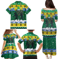 Gabon Christmas Family Matching Puletasi and Hawaiian Shirt with Black Panthers Carrying Tree and Green Yellow Snowflake Pattern - Wonder Print Shop