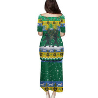 Gabon Christmas Family Matching Puletasi and Hawaiian Shirt with Black Panthers Carrying Tree and Green Yellow Snowflake Pattern - Wonder Print Shop