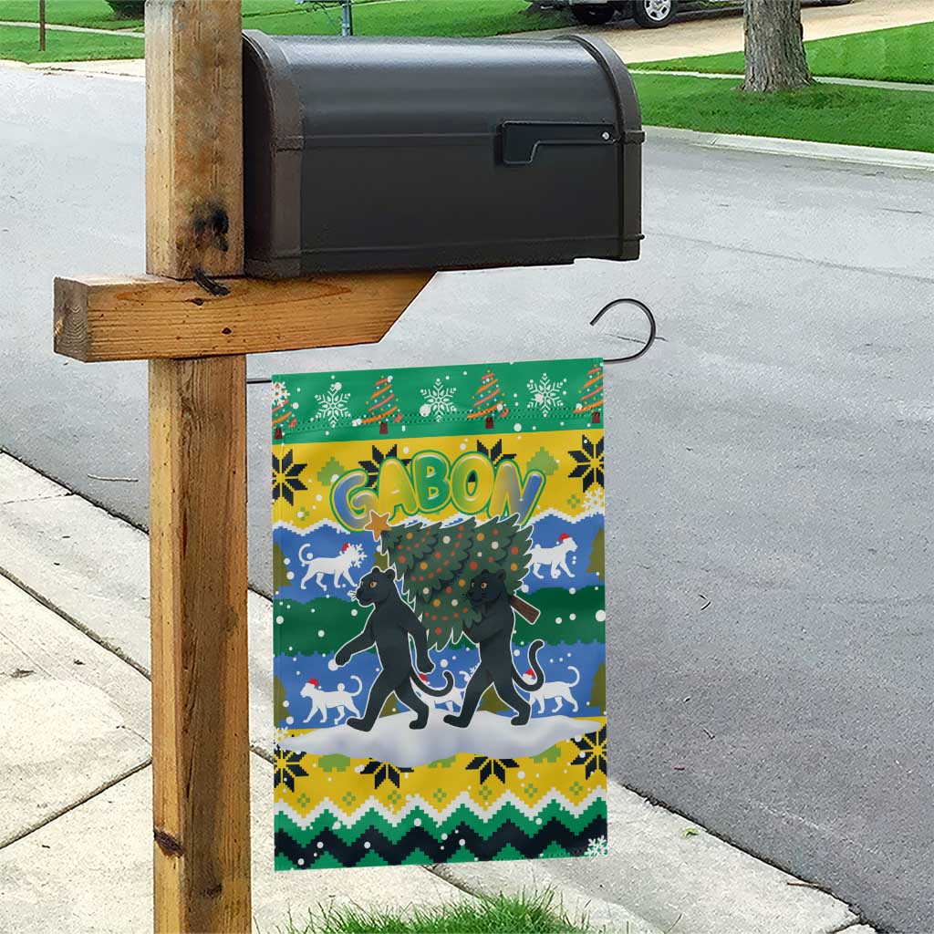 Gabon Christmas Garden Flag with Black Panthers Carrying Tree and Green Yellow Snowflake Pattern - Wonder Print Shop