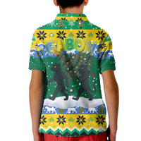 Gabon Christmas Kid Polo Shirt with Black Panthers Carrying Tree and Green Yellow Snowflake Pattern - Wonder Print Shop