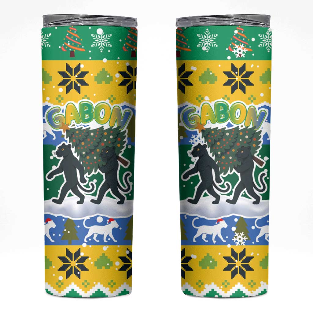 Gabon Christmas Skinny Tumbler with Black Panthers Carrying Tree and Green Yellow Snowflake Pattern - Wonder Print Shop