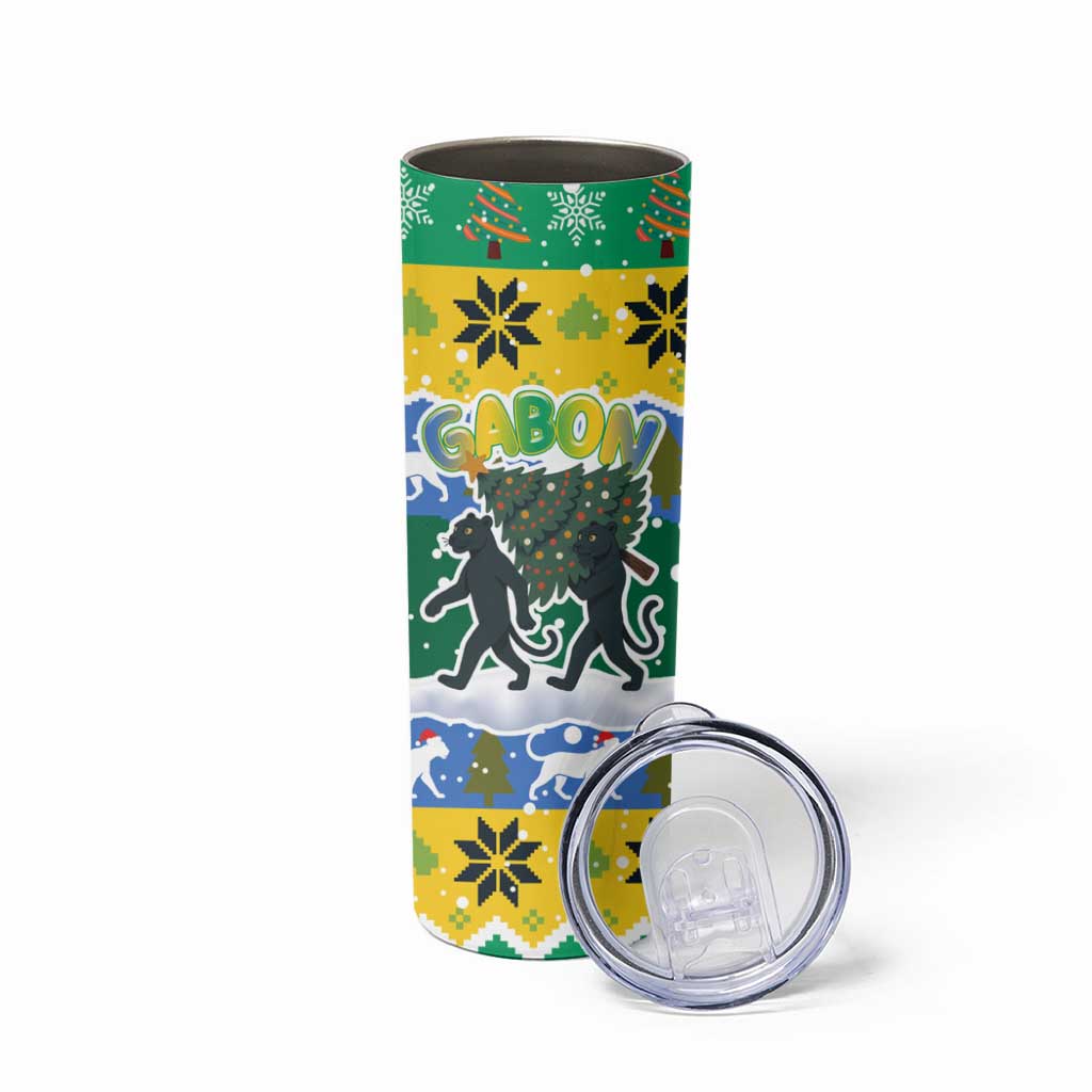 Gabon Christmas Skinny Tumbler with Black Panthers Carrying Tree and Green Yellow Snowflake Pattern - Wonder Print Shop