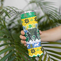 Gabon Christmas Skinny Tumbler with Black Panthers Carrying Tree and Green Yellow Snowflake Pattern - Wonder Print Shop