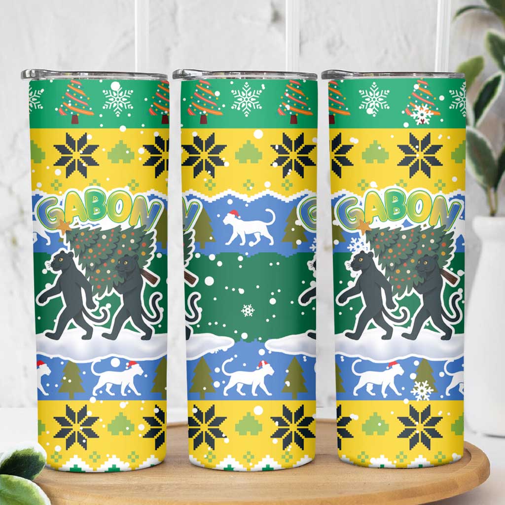 Gabon Christmas Skinny Tumbler with Black Panthers Carrying Tree and Green Yellow Snowflake Pattern - Wonder Print Shop