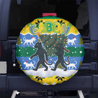 Gabon Christmas Spare Tire Cover with Black Panthers Carrying Tree and Green Yellow Snowflake Pattern - Wonder Print Shop