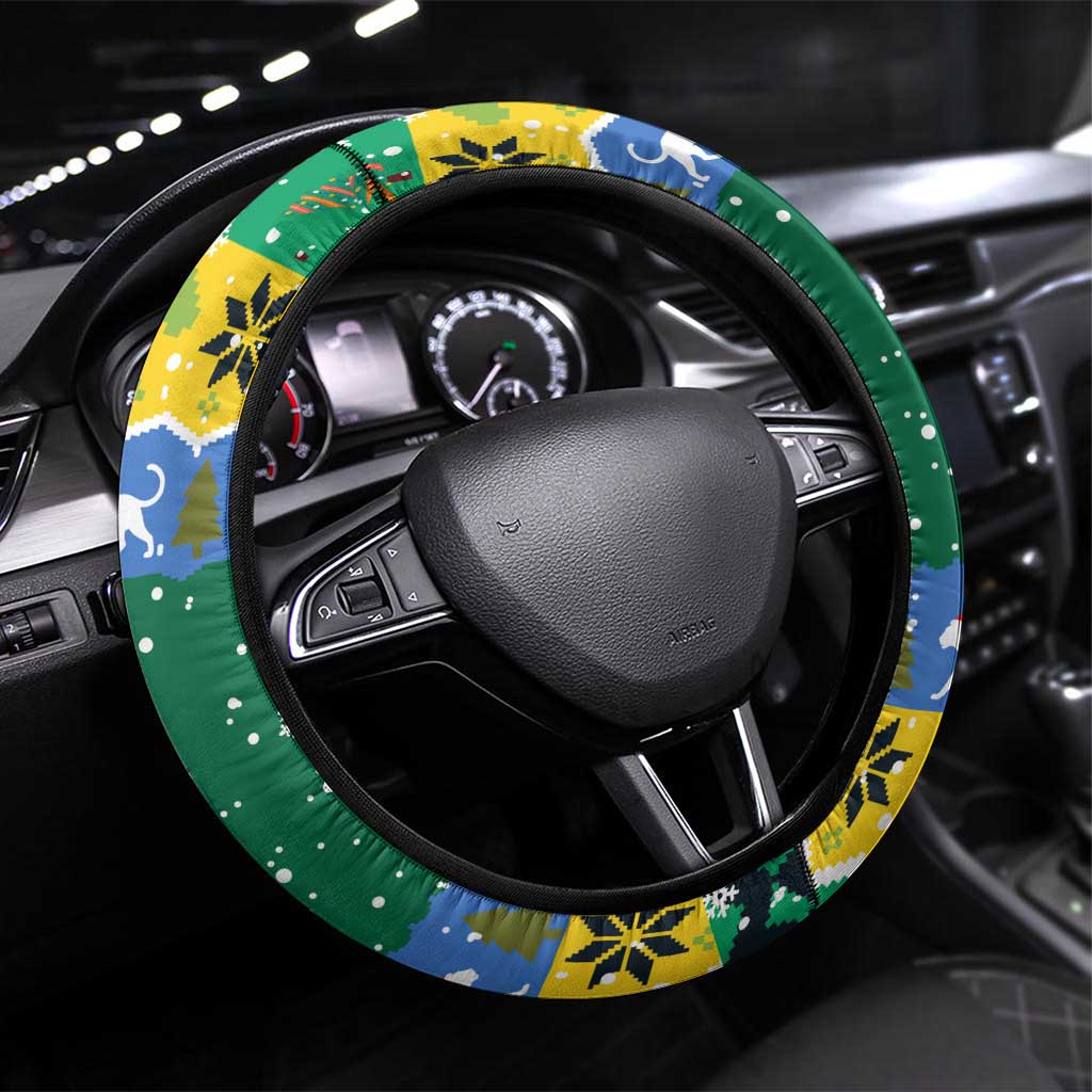 Gabon Christmas Steering Wheel Cover with Black Panthers Carrying Tree and Green Yellow Snowflake Pattern - Wonder Print Shop