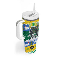 Gabon Christmas Tumbler With Handle with Black Panthers Carrying Tree and Green Yellow Snowflake Pattern - Wonder Print Shop