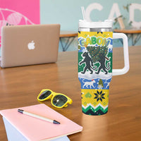 Gabon Christmas Tumbler With Handle with Black Panthers Carrying Tree and Green Yellow Snowflake Pattern - Wonder Print Shop