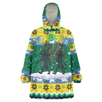 Gabon Christmas Wearable Blanket Hoodie with Black Panthers Carrying Tree and Green Yellow Snowflake Pattern - Wonder Print Shop