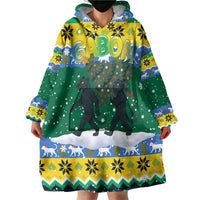 Gabon Christmas Wearable Blanket Hoodie with Black Panthers Carrying Tree and Green Yellow Snowflake Pattern - Wonder Print Shop