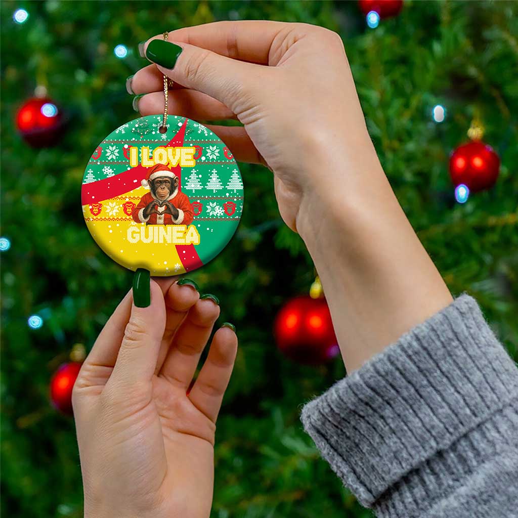 Guinea Christmas Ceramic Ornament with Santa Chimpanzee Heart Hands and Green Red Snowflake Pattern - Wonder Print Shop