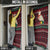Guinea Christmas Door Cover with Festive Dove String Lights and Red Black Holiday Pattern - Wonder Print Shop