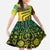 Grenada Tribal Floral Pattern Kid Short Sleeve Dress with Rasta Gradient and Flame Motto Design - Wonder Print Shop