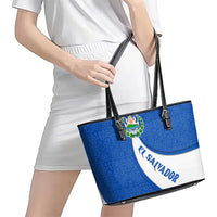 El Salvador Coat of Arms Leather Tote Bag with Curved Text and Blue Patterned Background - Wonder Print Shop