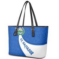 El Salvador Coat of Arms Leather Tote Bag with Curved Text and Blue Patterned Background - Wonder Print Shop