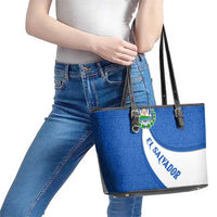 El Salvador Coat of Arms Leather Tote Bag with Curved Text and Blue Patterned Background - Wonder Print Shop