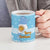 Argentina Christmas Ceramic Mug with Blue-White Snowflake Pattern, Sun Emblem, and Map Motif - Wonder Print Shop