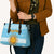 Argentina Christmas Leather Bag with Blue-White Snowflake Pattern, Sun Emblem, and Map Motif - Wonder Print Shop