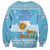 Argentina Christmas Sweatshirt with Blue-White Snowflake Pattern, Sun Emblem, and Map Motif - Wonder Print Shop