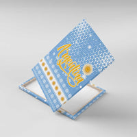 Argentina Christmas Canvas Wall Art with Blue-White Snowflake Pattern, Sun Emblem, and Gaucho Santa Riding Horse Motif - Wonder Print Shop