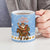 Argentina Christmas Ceramic Mug with Blue-White Snowflake Pattern, Sun Emblem, and Gaucho Santa Riding Horse Motif - Wonder Print Shop