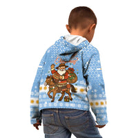Argentina Christmas Kid Hoodie with Blue-White Snowflake Pattern, Sun Emblem, and Gaucho Santa Riding Horse Motif - Wonder Print Shop