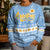 Argentina Christmas Kid Ugly Christmas Sweater with Blue-White Snowflake Pattern, Sun Emblem, and Gaucho Santa Riding Horse Motif - Wonder Print Shop