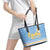 Argentina Christmas Leather Tote Bag with Blue-White Snowflake Pattern, Sun Emblem, and Gaucho Santa Riding Horse Motif - Wonder Print Shop