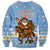 Argentina Christmas Sweatshirt with Blue-White Snowflake Pattern, Sun Emblem, and Gaucho Santa Riding Horse Motif - Wonder Print Shop