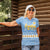 Argentina Christmas Women Polo Shirt with Blue-White Snowflake Pattern, Sun Emblem, and Gaucho Santa Riding Horse Motif - Wonder Print Shop