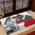 Greenland Rubber Doormat with Arctic Fox, Mountains, and Frozen Yet Fierce Text Design