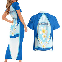 Nicaragua National Emblem Couples Matching Short Sleeve Bodycon Dress and Hawaiian Shirt with White Flor de Sacuanjoche and Blue Gradient Design - Wonder Print Shop