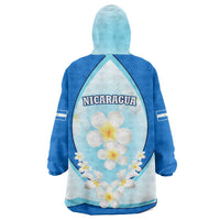 Nicaragua National Emblem Wearable Blanket Hoodie with White Flor de Sacuanjoche and Blue Gradient Design - Wonder Print Shop