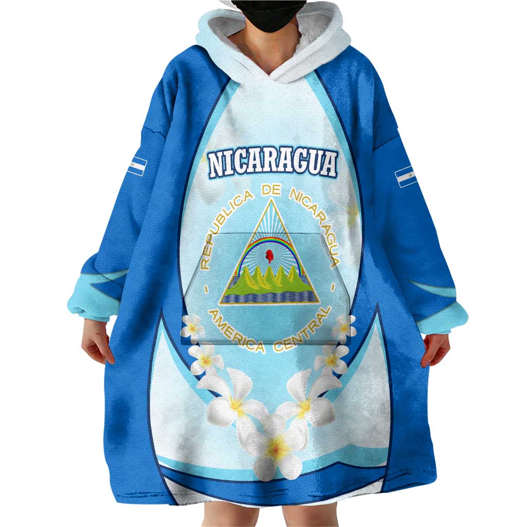 Nicaragua National Emblem Wearable Blanket Hoodie with White Flor de Sacuanjoche and Blue Gradient Design - Wonder Print Shop