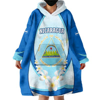 Nicaragua National Emblem Wearable Blanket Hoodie with White Flor de Sacuanjoche and Blue Gradient Design - Wonder Print Shop