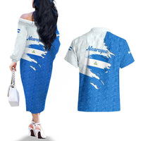 Nicaragua Flag Ripped Effect Couples Matching Off The Shoulder Long Sleeve Dress and Hawaiian Shirt with National Emblem and Floral Pattern Design - Wonder Print Shop