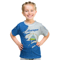 Nicaragua Flag Ripped Effect Kid T Shirt with National Emblem and Floral Pattern Design - Wonder Print Shop