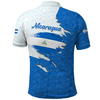 Nicaragua Flag Ripped Effect Polo Shirt with National Emblem and Floral Pattern Design - Wonder Print Shop