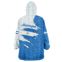 Nicaragua Flag Ripped Effect Wearable Blanket Hoodie with National Emblem and Floral Pattern Design - Wonder Print Shop