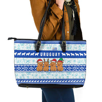 Uruguay Christmas Leather Tote Bag with Capybaras Holiday Tree Sun Emblem and Blue Festive Pattern - Wonder Print Shop