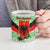 Albania Christmas Ceramic Mug with Green-Red Design, Double-Headed Eagle Emblem, and Santa Motif - Wonder Print Shop