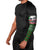 Guadeloupe Christmas Arm Sleeves with Green-Red Plaid Design, Sun and Sugarcane Emblem, and Santa Sleigh Motif - Wonder Print Shop